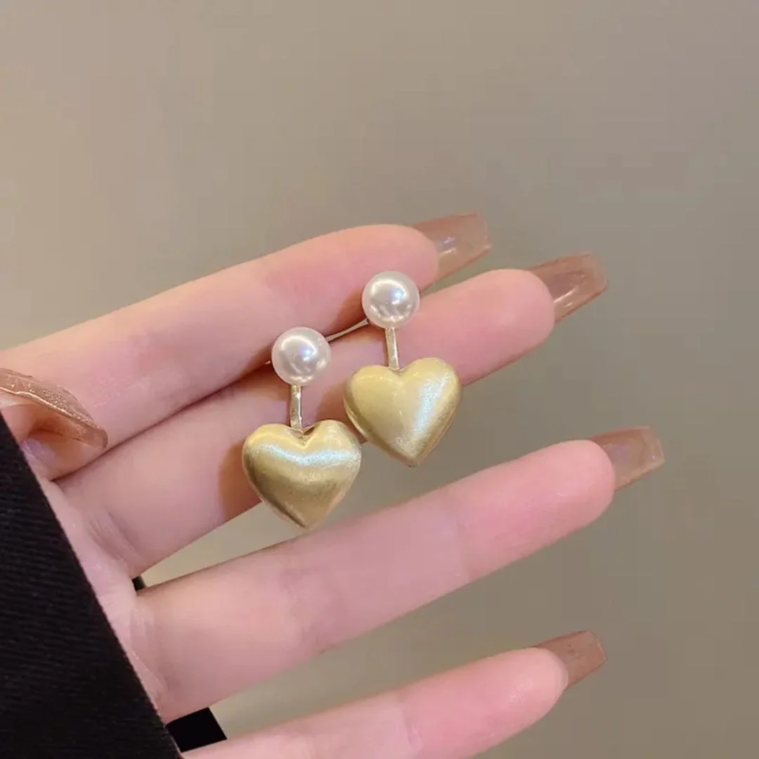 A pearl of golden heart earrings - Image 3