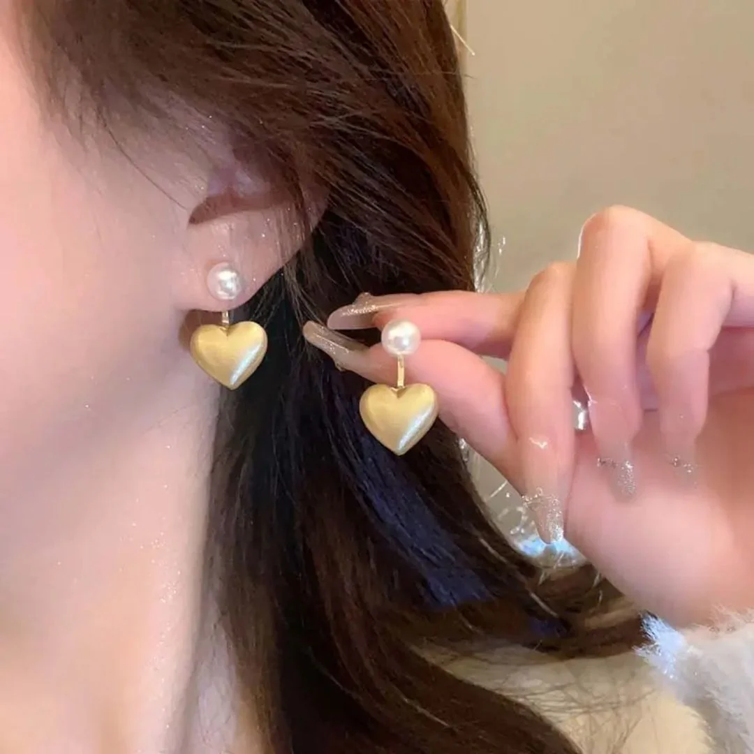 A pearl of golden heart earrings - Image 4